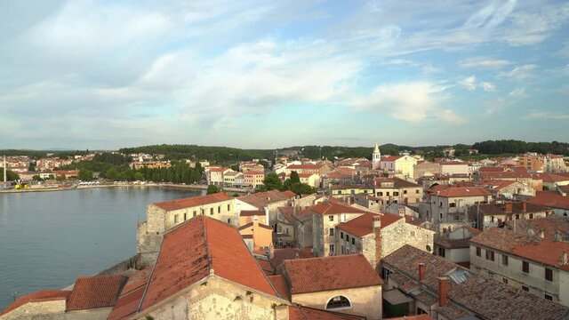 Panoramic aerial view from the Euphrasian Basilica on Porec at sunset, Croatia.