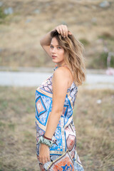 Natural Looking Young Beautiful Woman with Hazel eyes posing in the fields, no post editing