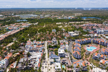 Caribbean city. Aerial view from drone. Travel destinations. Summer vacations. Bavaro. Dominican Republic - obrazy, fototapety, plakaty