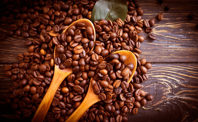 wooden spoon, roasted grains background
