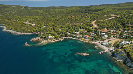 Fototapeta na wymiar Aerial drone photo of famous bay and small traditional village of Atsitsa covered in pine trees and natural sandy beaches, Skiros island, Sporades, Greece