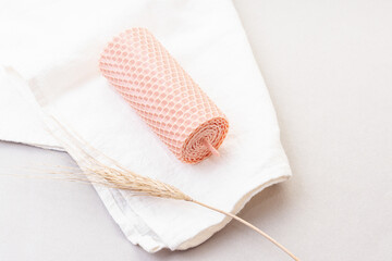 Decorative pink candle made of beeswax. Natural eco product