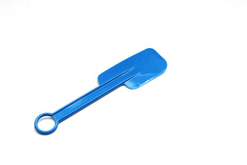 Blue plastic spatula isolated on white background