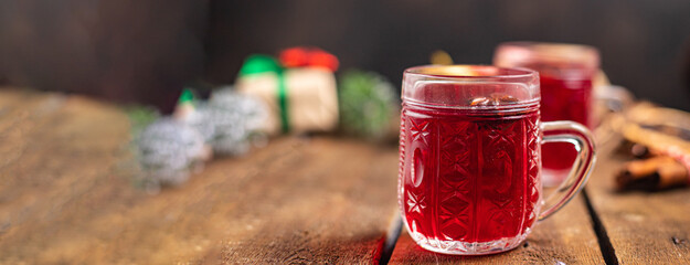 mulled wine christmas celebrate new year spice juice star anise, cinnamon cozy fresh hot warming drink sweet beverage meal on the table copy space food background rustic 