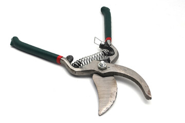 Pruning scissors (Pruning shears, Garden secateurs) with green grip isolated on white background