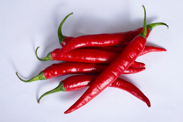  red chilli peppers isolated on white background