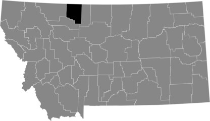 Black highlighted location map of the Toole County inside gray map of the Federal State of Montana, USA