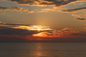 Scenic sunset over the sea. Calm Baltic sea. Poland seaside,  Dabki village and beach. Seascape