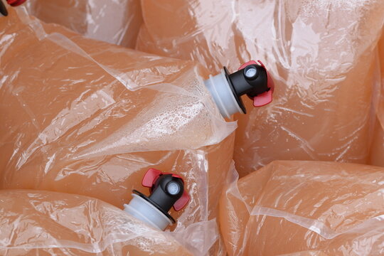 Apple juice bag-in-box packagings closeup