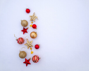 bright trinkets, Christmas balls, snowflakes and stars in the snow. christmas decorations