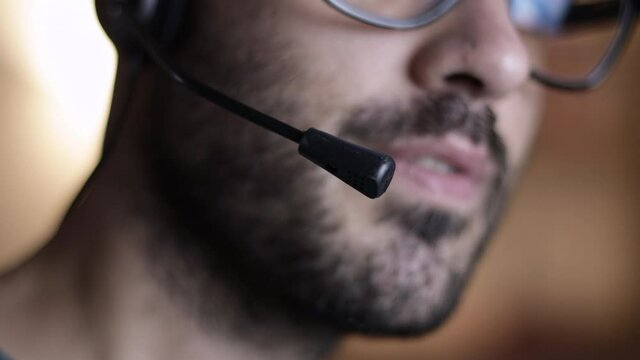 Closeup of support operator. Mic and mouth, shallow depth of field