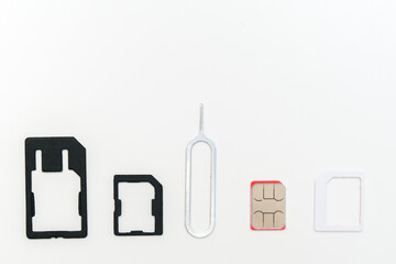 Sim card,sim card adapter, sim card eject tool for changing or removing, digital media put on white background