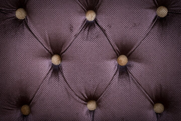 Dark brown violet silk velvet luxury capitone buttoned background