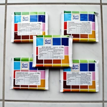 Waldenbuch, Germany - 2015: Ritter Sport chocolate in trial flavors, unreleased labels in German: White Yogurt Mousse, Chocolate Brownie, White Mint Crisp, Cranberry with Kick, Honey and Crisp. 