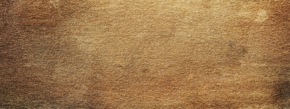 Abstract brown stone wall, background - in the form of a rough embossed stone surface, closeup
