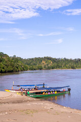 Fototapeta na wymiar Canoes on the beach of Misahualli, Napo province, Ecuador