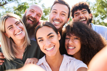 Multiracial people taking selfie outdoors - Happy life style concept with young smiling friends having fun together.