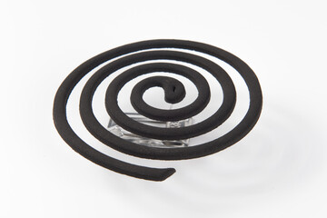 mosquito repellent coil emit smoke to repel mosquito on white background