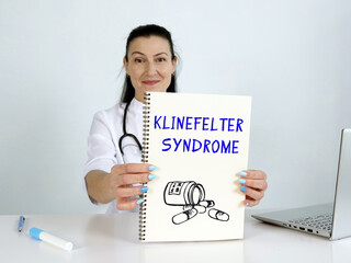  KLINEFELTER SYNDROME text in list. Podiatrist looking for something at laptop.
