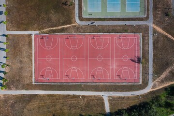 Empty basketball courts. View from the drone perpendicularly down - obrazy, fototapety, plakaty