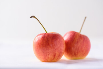 Organic red apple on white background