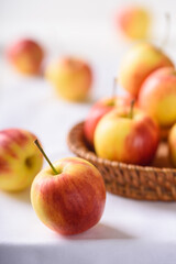 Organic red apple on white background