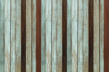 Old wooden house wall with many colors in vintage style texture and background seamless
