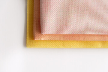 Fototapeta premium Canvas for needlework aida 14 yellow, pink, peach. Cross Stitch