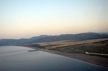 Aerial view. Liner landing in International Dalaman airport at morning.Turkey