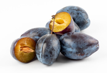 fresh plum fruit  and cut plum slices isolated on white background. 