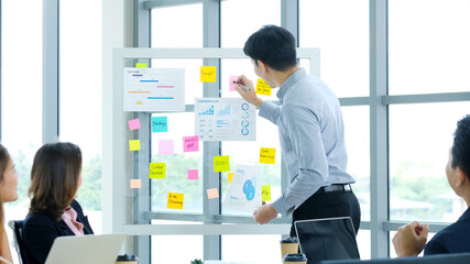 Business meeting for presenting business plan information at office, Asian man explaning business...