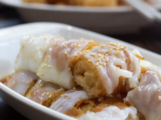 Zhaliang (fried dough rice noodle rolls) or Chee Cheong Fun You Tiao. Singapore Chee Cheong Fun Youtiao Closeup.