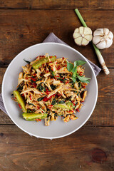 Ayam suwir rica rica kemangi or shredded spicy chicken with basil.
