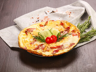 Tasty breakfast – omelet with meat