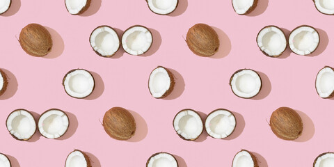 Coconuts seamless pattern on a pink background.