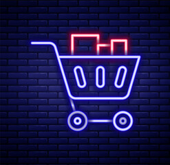 Glowing neon line Shopping cart and food icon isolated on brick wall background. Food store, supermarket. Colorful outline concept. Vector