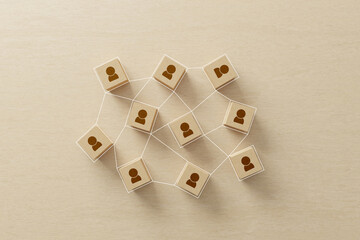 Wooden blocks with people human icon, Building a strong team, Human resources and management concept. 3d illustration