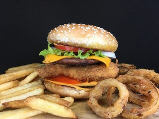 fresh tasty burger isolated on dark background
