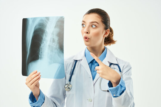 woman radiologist from examination x-ray emotion