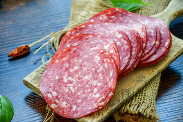 Italian  dried thinly sliced   artisan  pork salami Milano , parmesan cheese, grissini , tomatoes  ...
