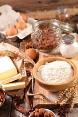 baking food ingredient- flour, butter, rolling pin, chocolate and nuts