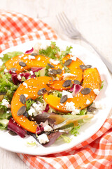 pumpkin slice salad with cheese and lettuce