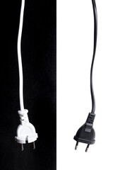 Two black and white european electricity plugs. Energy concept.