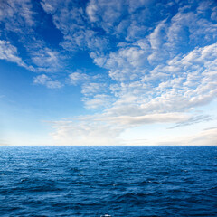 Naklejka na ściany i meble tropical sea with blue sky and clouds
