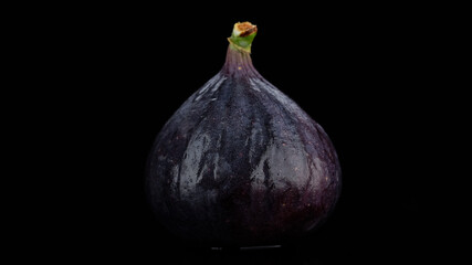 Fig isolated on black background. 