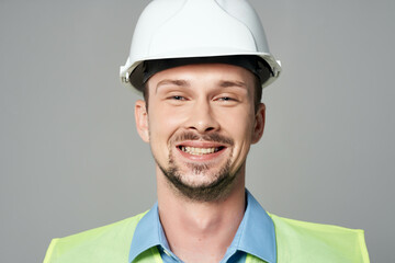 man in construction uniform Professional Job light background