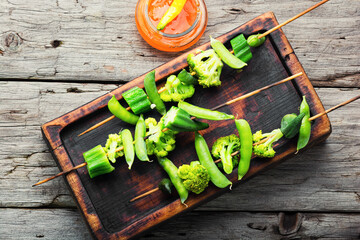 Fototapeta na wymiar Grilled vegetables on skewers