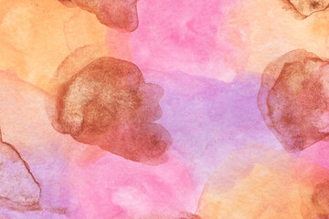 Colorful watercolor texture with golden spots. Abstract hand-drawn background in pink, yellow and purple colors.