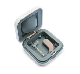 Box with hearing aid on white background