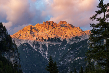 Mountain peak of Rautkofel or Monte Rudo, Mountain Range of the Rondoi-Baranci at sunset, seen from the Landro valley (Val di Landro), Dolomiti Di Sesto Natural Park, Trentino, Italy, Europe.
